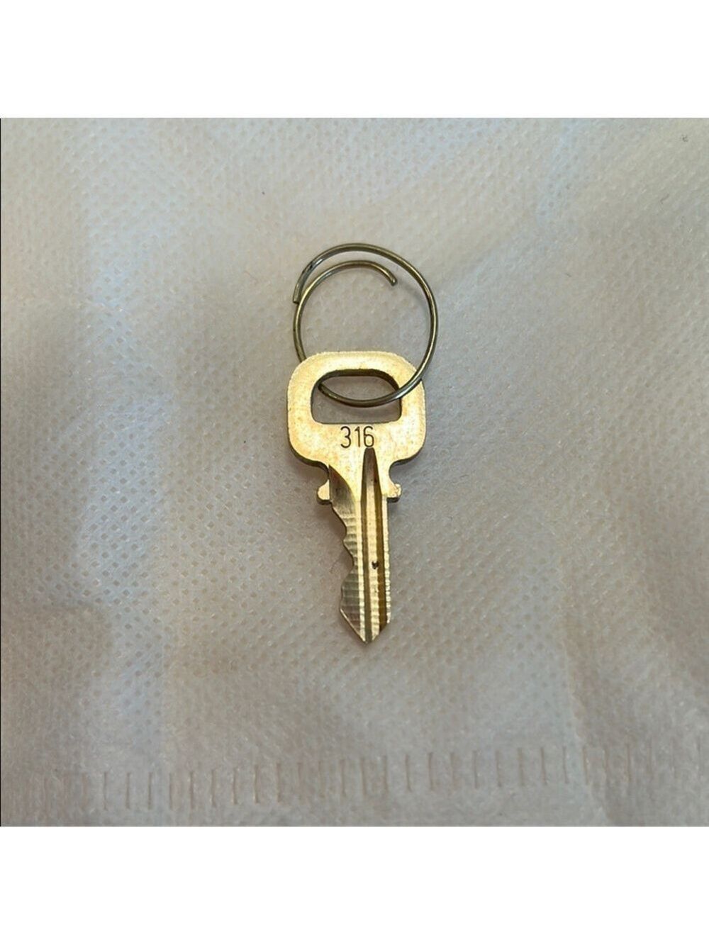 Louis Vuitton Gold tone key #316